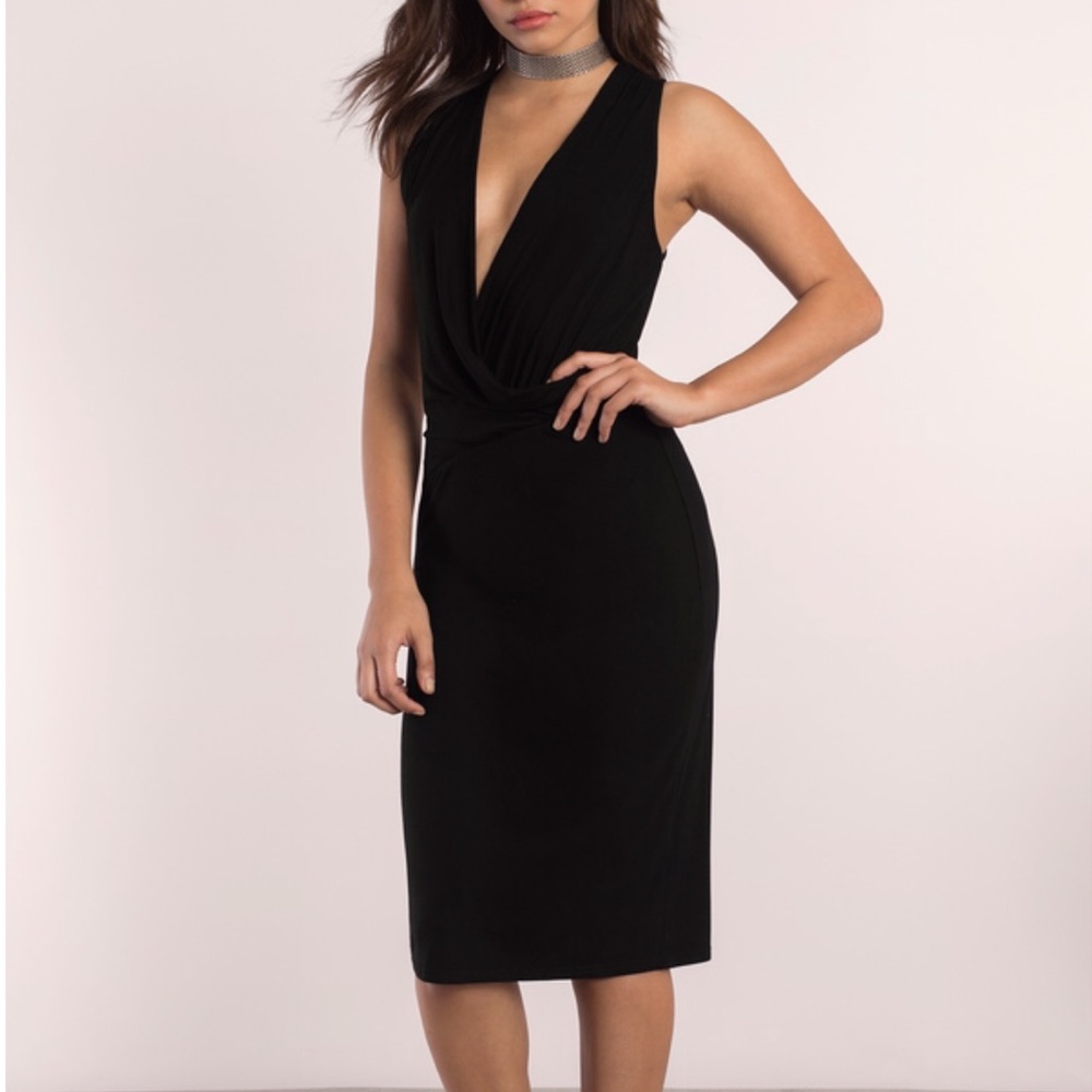 New with tags black midi dress